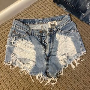 Levi’s blue ripped high waisted Jean shorts